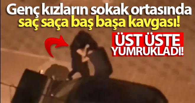 Genç kızların sokak ortasında saç saça baş başa kavgası