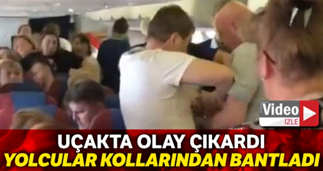Rusya'da uçakta olay çıkaran yolcuya ‘bantlı' müdahale