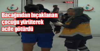 Bacağından bıçaklanan çocuğu yürüterek acile götürdü